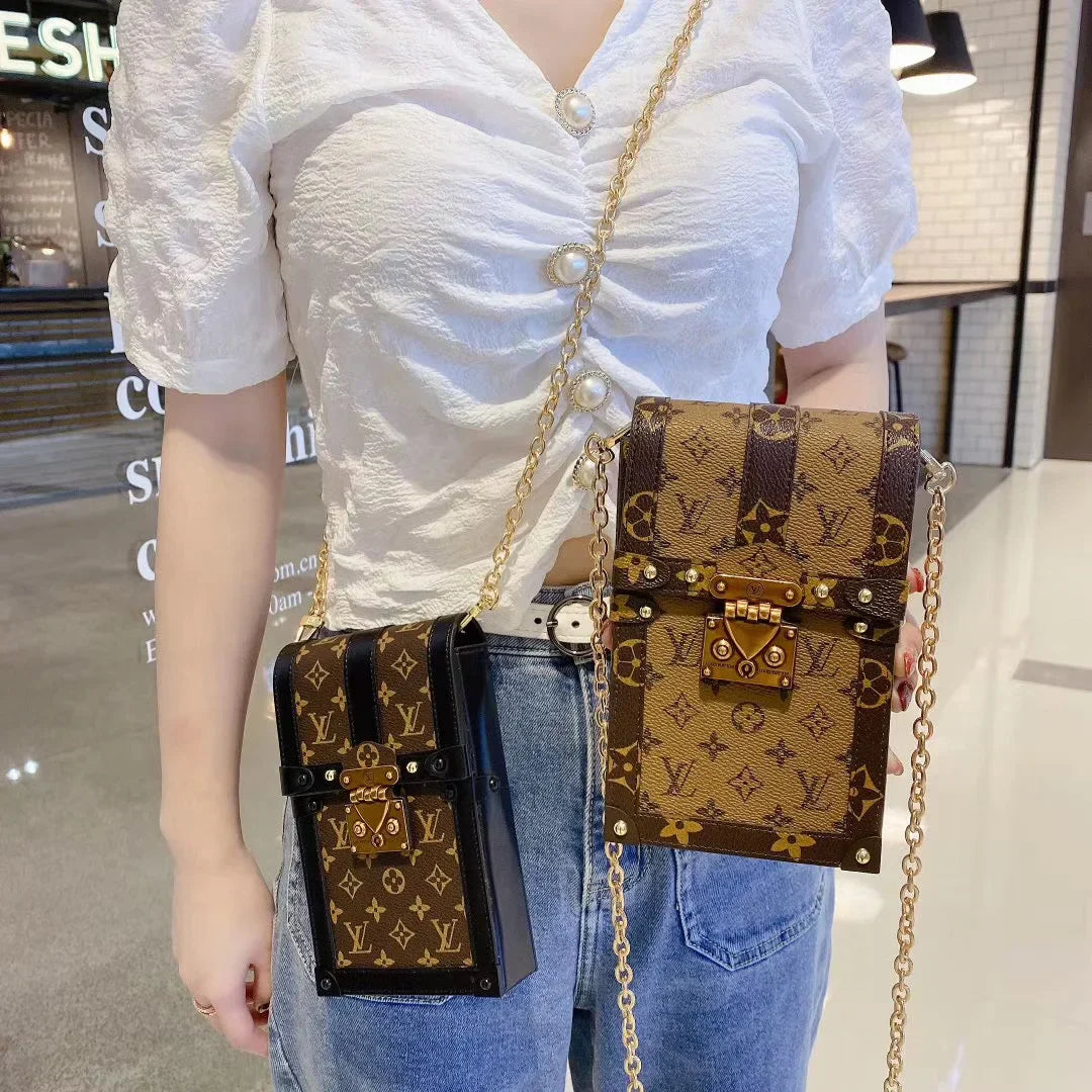 Monogram canvas en lederen kofferbak crossbody tas