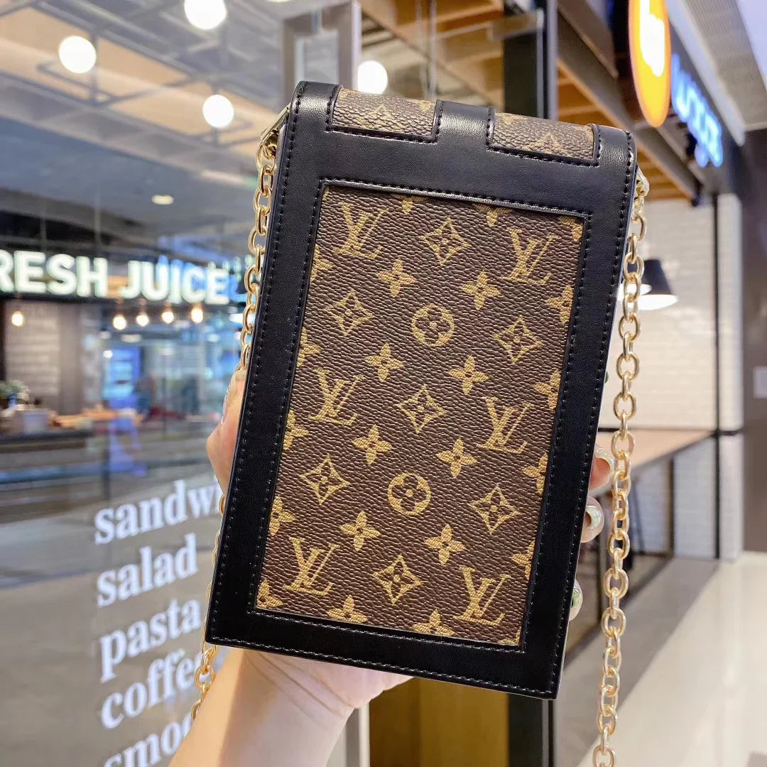Monogram canvas en lederen kofferbak crossbody tas