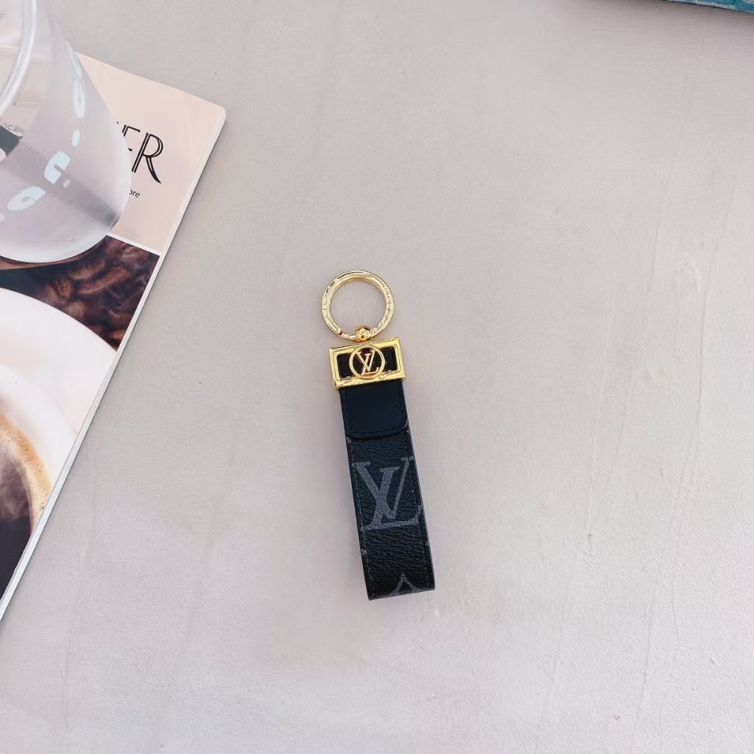 Luksus LV Monogram Keychain med elegant guld accent