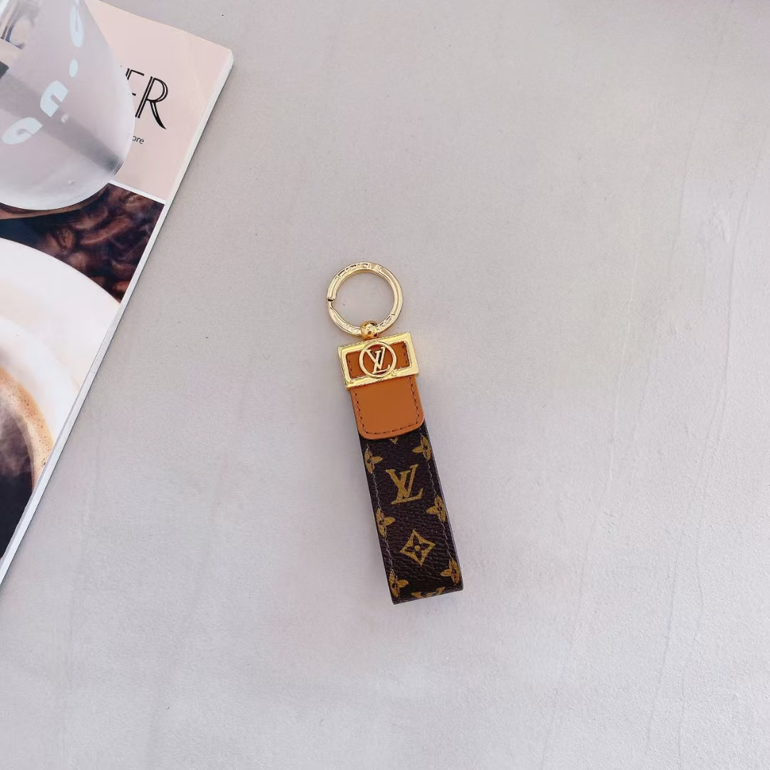 Luksus LV Monogram Keychain med elegant guld accent