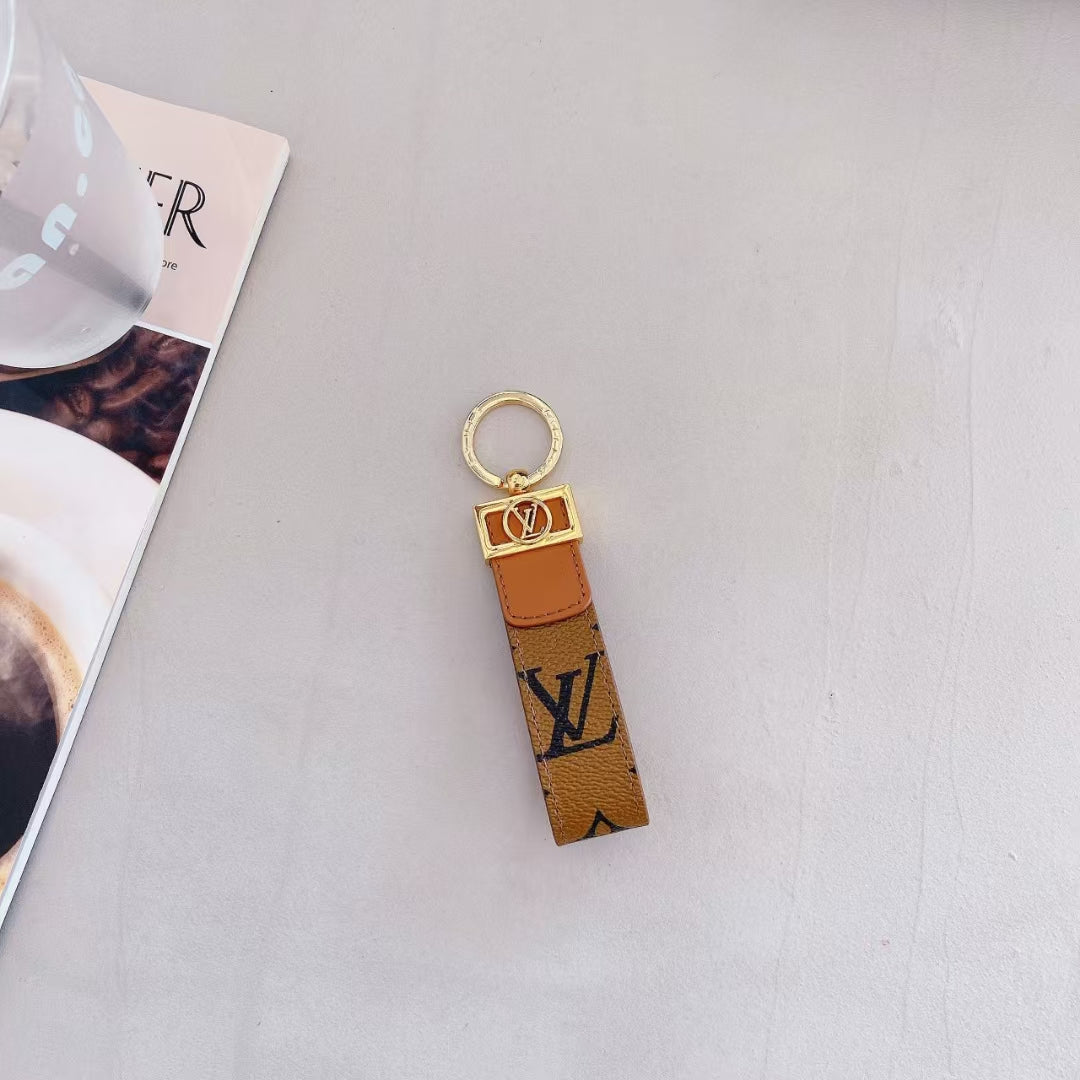 Luksus LV Monogram Keychain med elegant guld accent