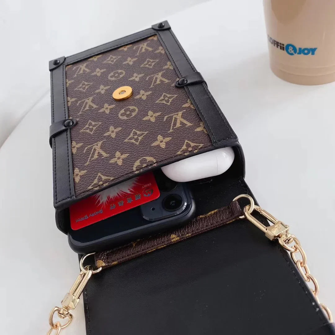 Monogram canvas en lederen kofferbak crossbody tas