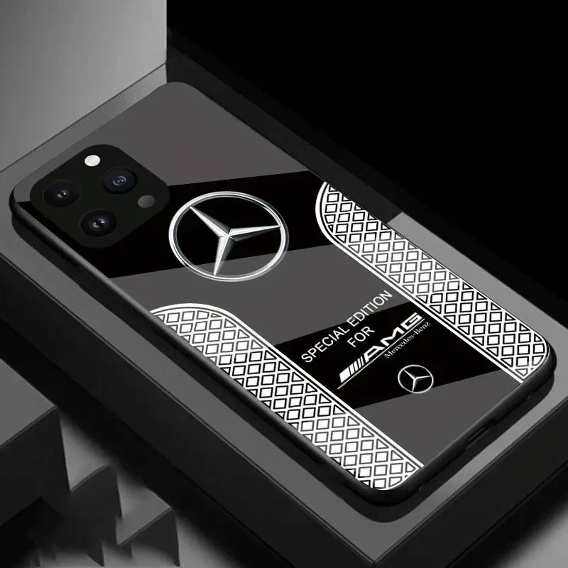La custodia del telefono del logo AMG di lusso per tutti gli iPhone con posteriore in vetro, supporta la ricarica wireless