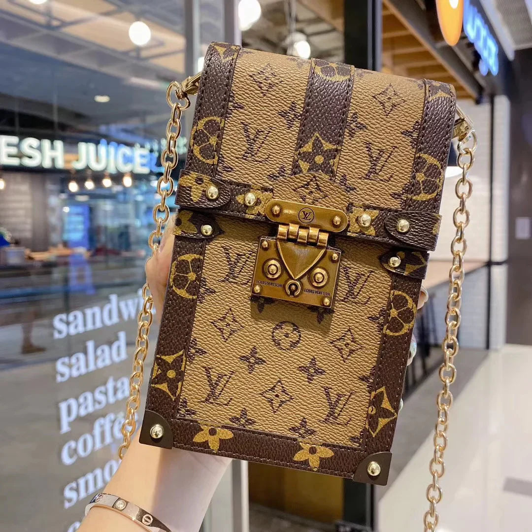 Monogram canvas en lederen kofferbak crossbody tas