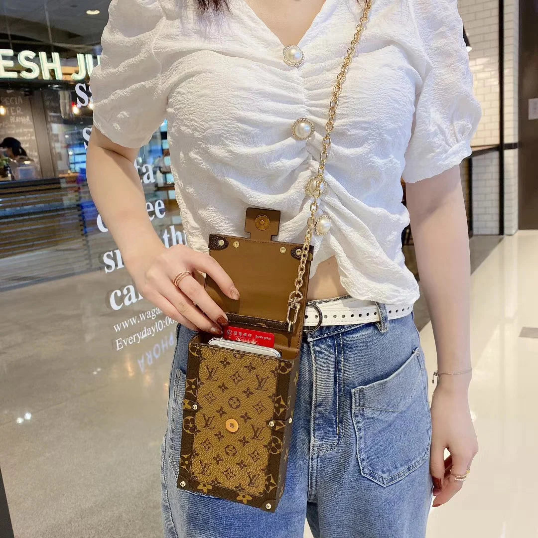Monogram canvas en lederen kofferbak crossbody tas