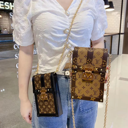 Monogram canvas en lederen kofferbak crossbody tas