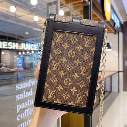 Monogram canvas en lederen kofferbak crossbody tas