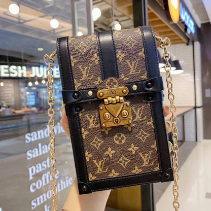 Monogram canvas en lederen kofferbak crossbody tas